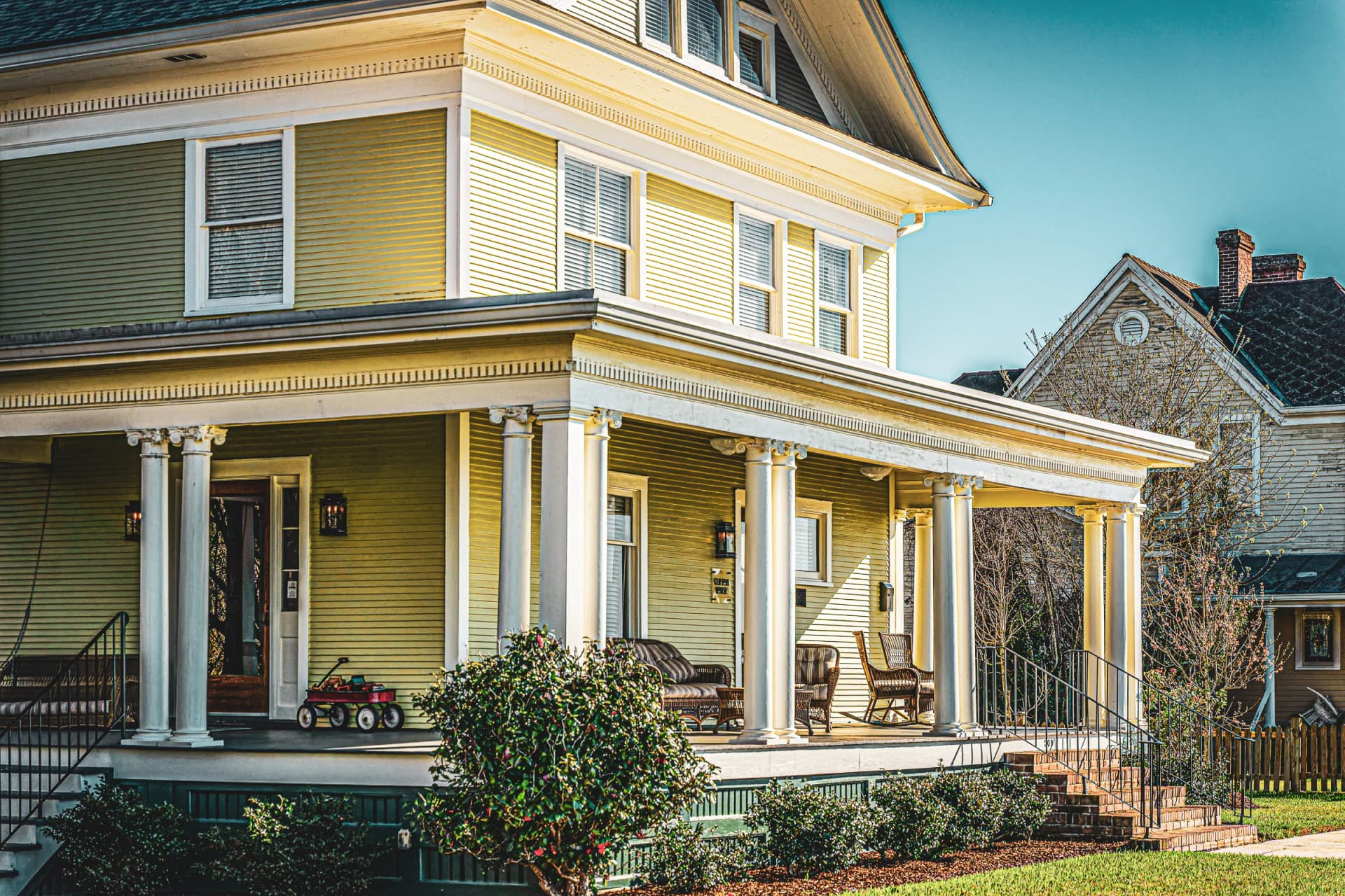 Pink azaleas cascading along Natchez sidewalk
